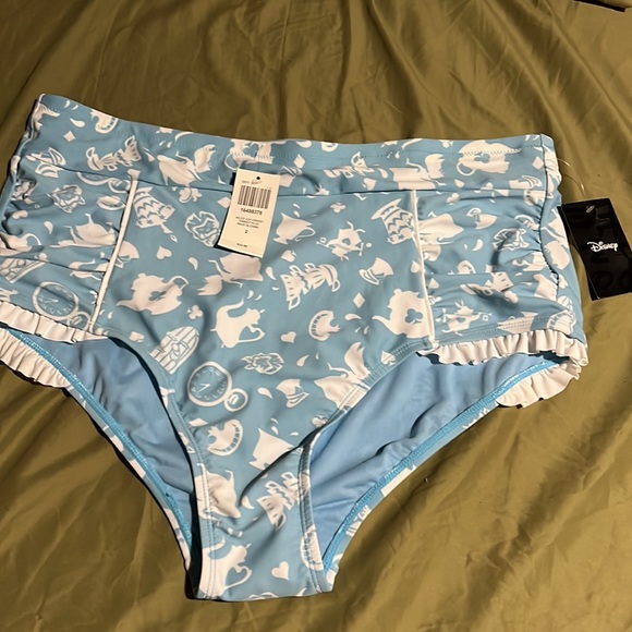 Alice in wonderland swimsuit from hot topic it’s a little large for me - Picture 2 of 3